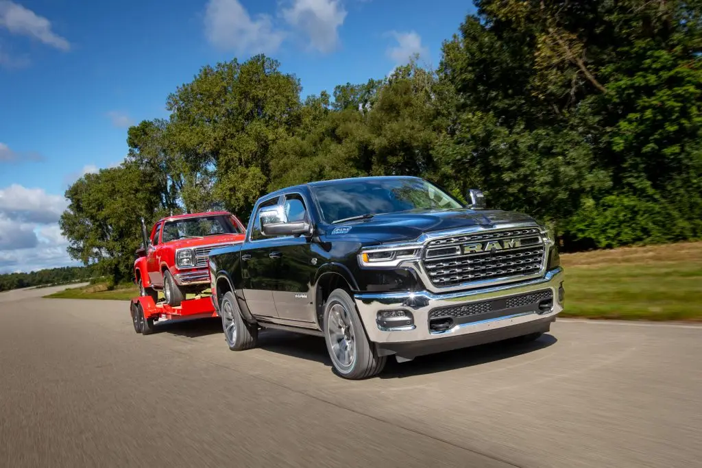 2026 Ram 1500 Limited 5.7-liter HEMI® V-8 eTorque towing the 1978 Li’l Red Express